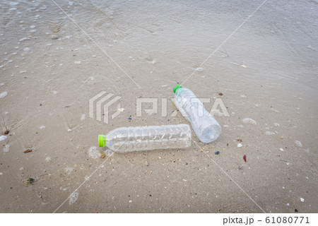 Garbage in the sea with plastic bottle on beach Garbage in the sea with plastic bottle on beach 61080771