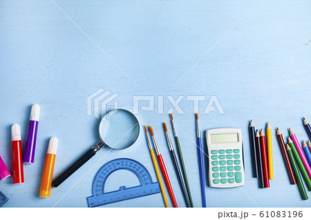 Items for the school on a wooden table. Items for the school on a wooden table. 61083196