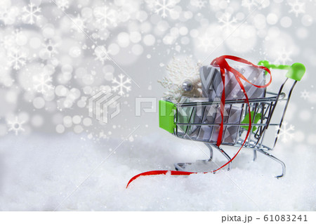 Christmas gifts and shopping cart. 61083241