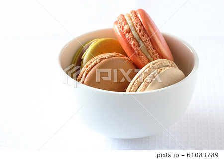 colourful french macaroons on white background colourful french macaroons on white background 61083789