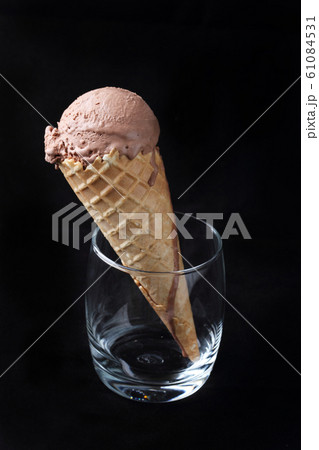 chocolate flavor ice cream cone in a glass chocolate flavor ice cream cone in a glass 61084531