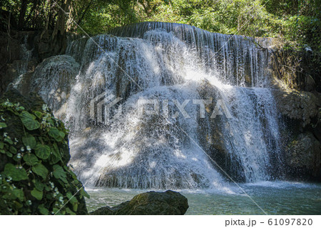 The clean waterfall there is an emerald green The clean waterfall there is an emerald green 61097820