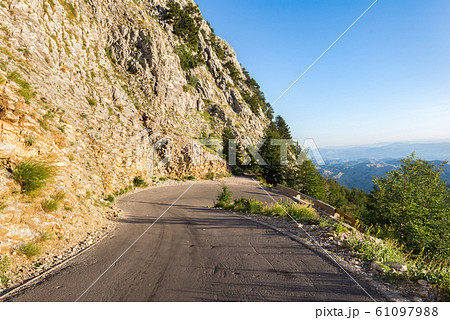 Turn of the road in mountains Turn of the road in mountains 61097988