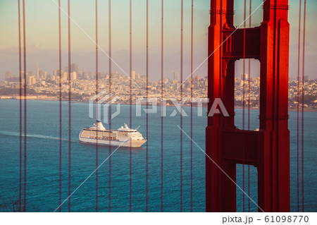 Golden Gate Bridge with cruise ship at sunset, San Francisco, California, USA 61098770