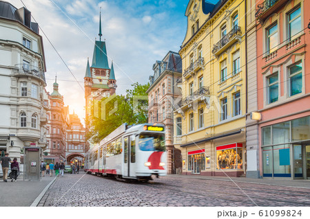 Historic town of Freiburg im Breisgau with tram at sunset, Baden Wurttemberg, Germany Historic town of Freiburg im Breisgau with tram at sunset, Baden Wurttemberg, Germany 61099824