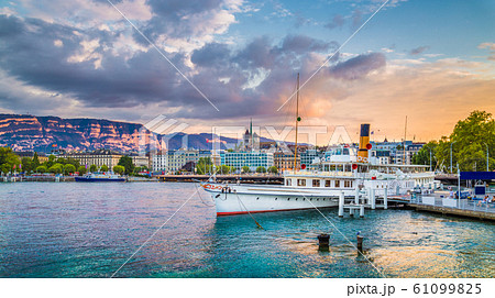 Historic city center of Geneva with paddle steamer at sunset, Switzerland Historic city center of Geneva with paddle steamer at sunset, Switzerland 61099825