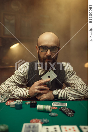 Bearded poker player show ace card, casino 61100065