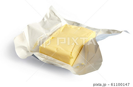 Piece of butter, isolated on white background, selective focus 61100147
