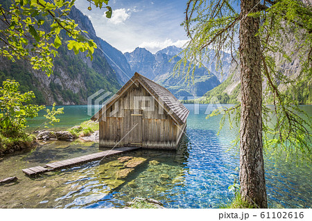 Lake Obersee with boat house in summer, Bavaria, Germany 61102616