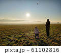 Dad and daughter flying RC plane 61102816