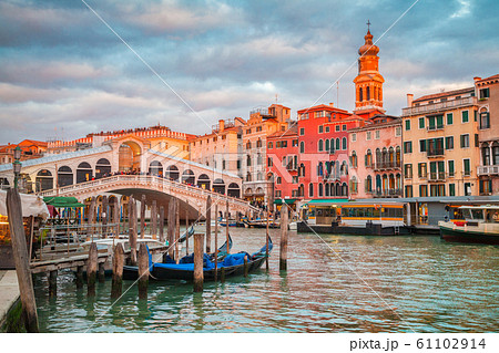 Canal Grande with Gondolas and Rialto Bridge at sunset, Venice, Italy 61102914