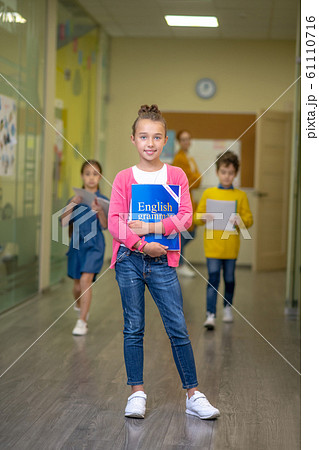 Pupils going out of their English classroom 61110716