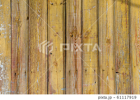 Old shabby wooden planks with cracked color paint 61117919