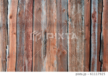 Old shabby wooden planks with cracked color paint 61117925