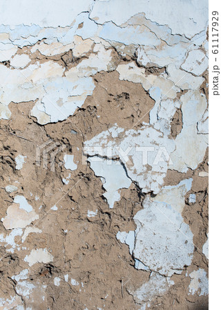 Old traditional stucco adobe from straw and clay 61117929