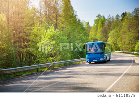 Bus on asphalt road in beautiful spring day 61118578