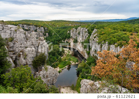 River in the beautiful Ardeche gorge near River in the beautiful Ardeche gorge near 61122621