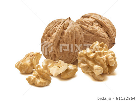 Shelled walnuts and nuts in shells isolated on white background 61122864