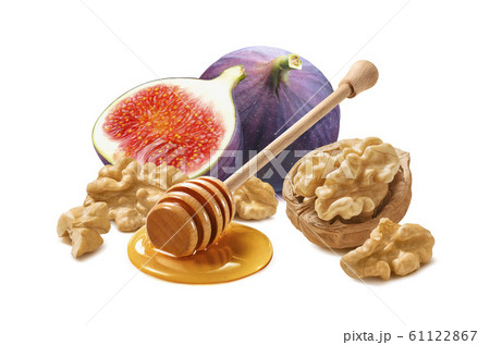 Walnuts, fresh fig and honey dip isolated on white 61122867