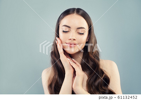 Healthy woman with long brown hair. Healthy woman with long brown hair. 61132452