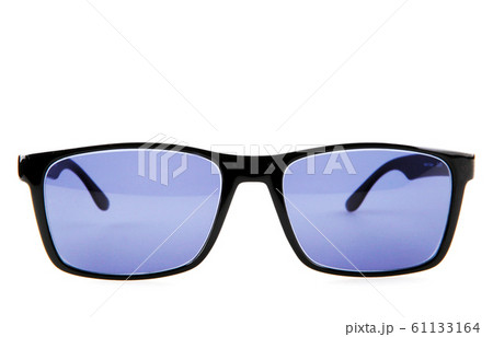 Close-Up Of Sunglasses Against White Background Close-Up Of Sunglasses Against White Background 61133164