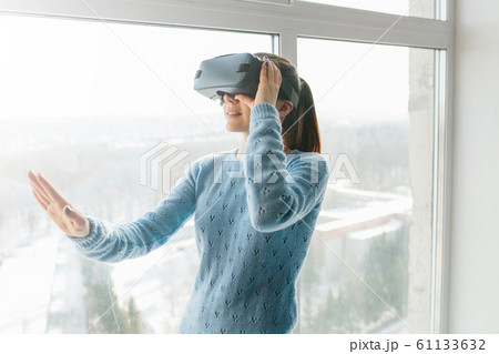 The girl in virtual glasses. VR 61133632