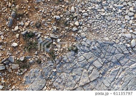 Rough stone surface as background texture 61135797