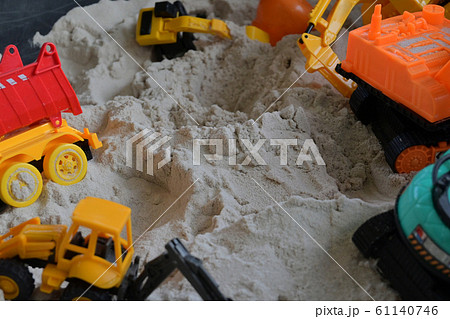 small kid toy vehicle construction in sand playground 61140746