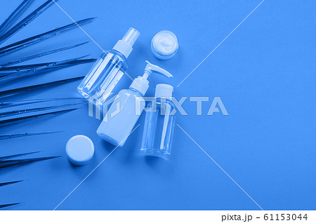 Generic beauty products on classic blue background 61153044