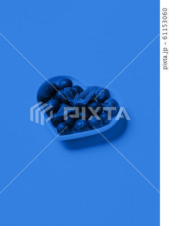 Classic blue toned heart of blueberries 61153060