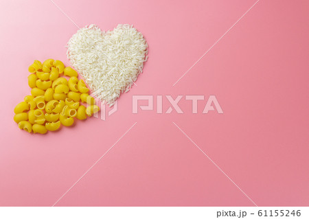 two hearts shape from pasta, rice valentines day background 61155246