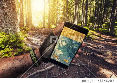 Smartphone GPS navigator in man's hand. 61156207