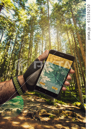 Smartphone GPS navigator in man's hand. Smartphone GPS navigator in man's hand. 61156230