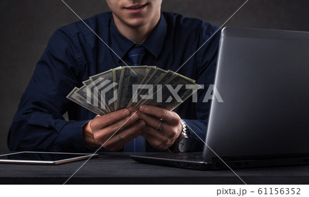 money in the hands of a man close-up. Business concept money in the hands of a man close-up. Business concept 61156352