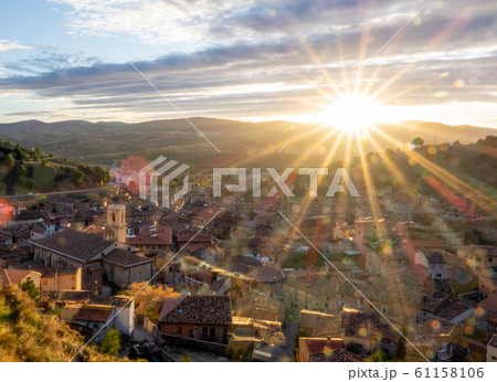 Sunset sky over Daroca antique village with tile roofs 61158106