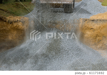 Excavator at construction excavator with a bucket 61171692