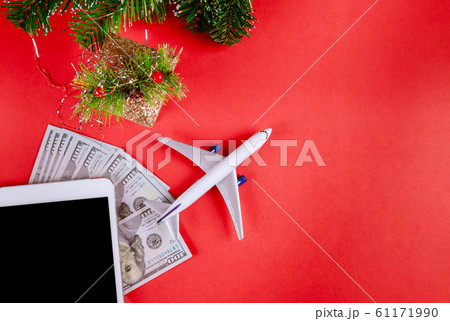 US dollar banknotes, digital devices tablet with US dollar banknotes, digital devices tablet with 61171990