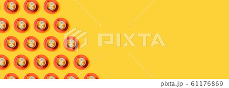 Cups of coffee on yellow background. 61176869