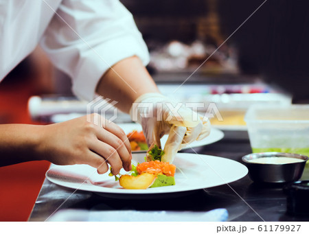 Chef cooking, Chef preparing food in the kitchen, 61179927