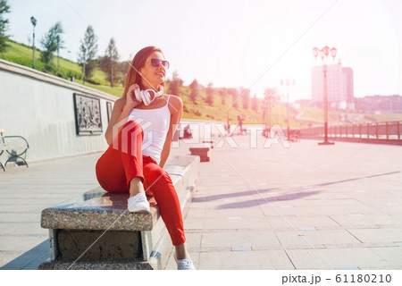 Student girl outdoors 61180210