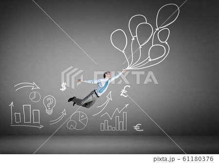 Businessman fly on balloons Businessman fly on balloons 61180376