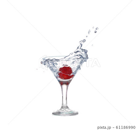 Strawberries, ice cubes into the glass 61186990