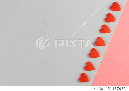 red hearts on a blue and pink background 61187075