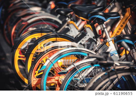 Share electric bikes parked on the sidewalk, Hangzhou 61190655