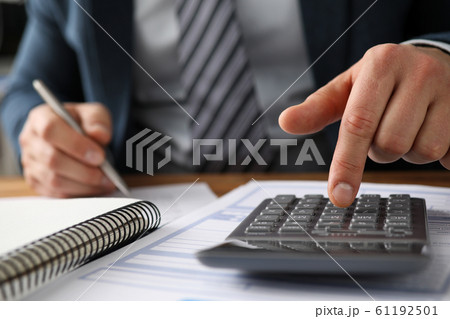 Man in presentable suit in office 61192501