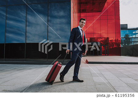 Young businessman going on trip stock photo 61195356