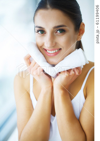 Face Washing. Happy Woman Drying Skin With Towel 61199406