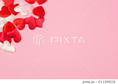 Red hearts for Valentine's day on a beautiful pink background. 61199818