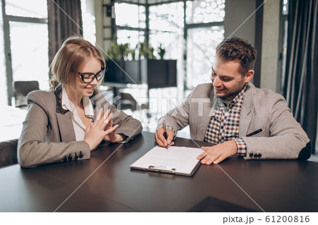 Smiling Cute Female Applicant and Contract Smiling Cute Female Applicant and Contract 61200816