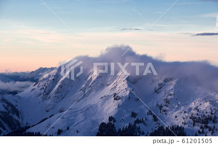 Mountain portrait Birnhorn Saalbach sunset clouds perfect blue sky purple light 61201505